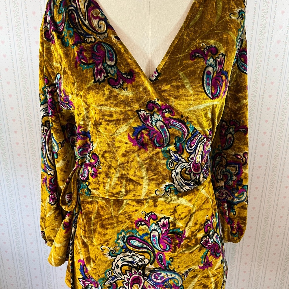Velvet gold floral wrap shirt.